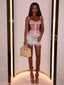 Muse Corset in Pink - Bendita Boutique Dubai, worn with a white satin mini skirt